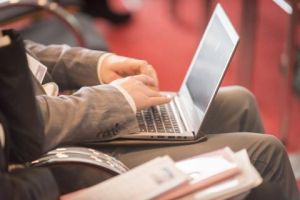 Man typing on laptop